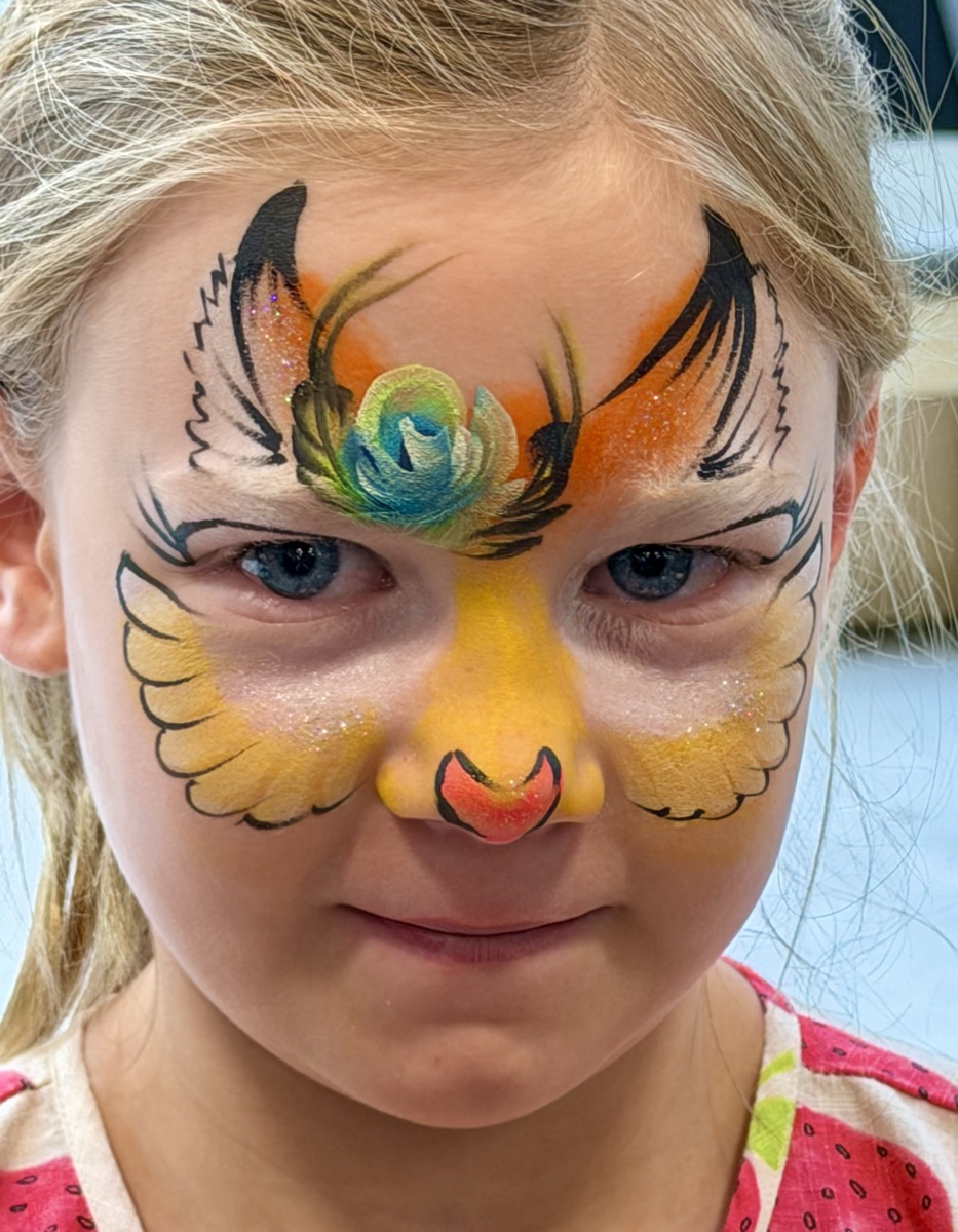 Yellow phoenix design with green tuft