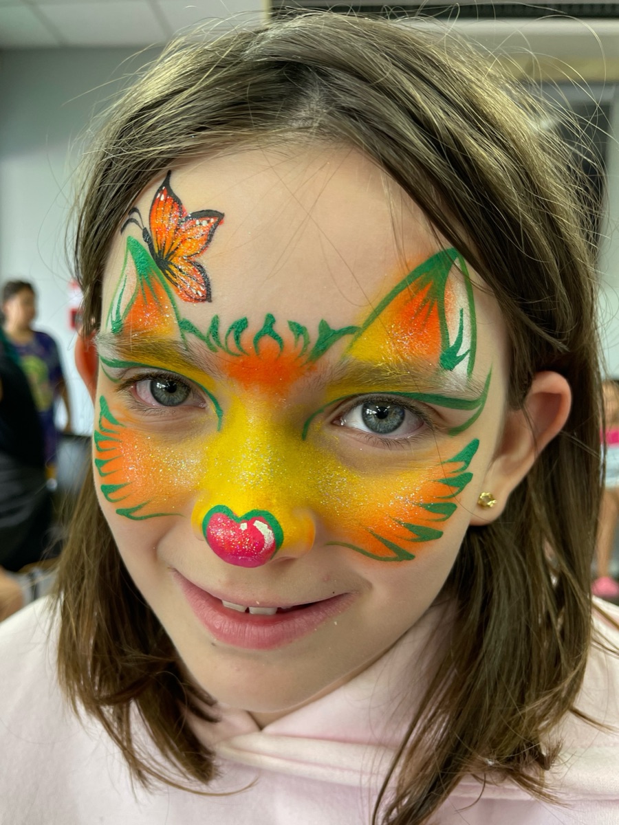 Green and orange fox face