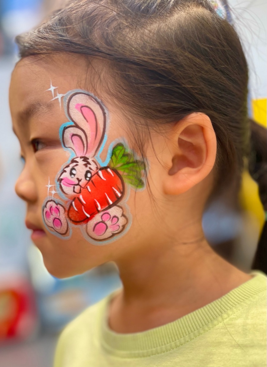 Bunny holding a carrot
