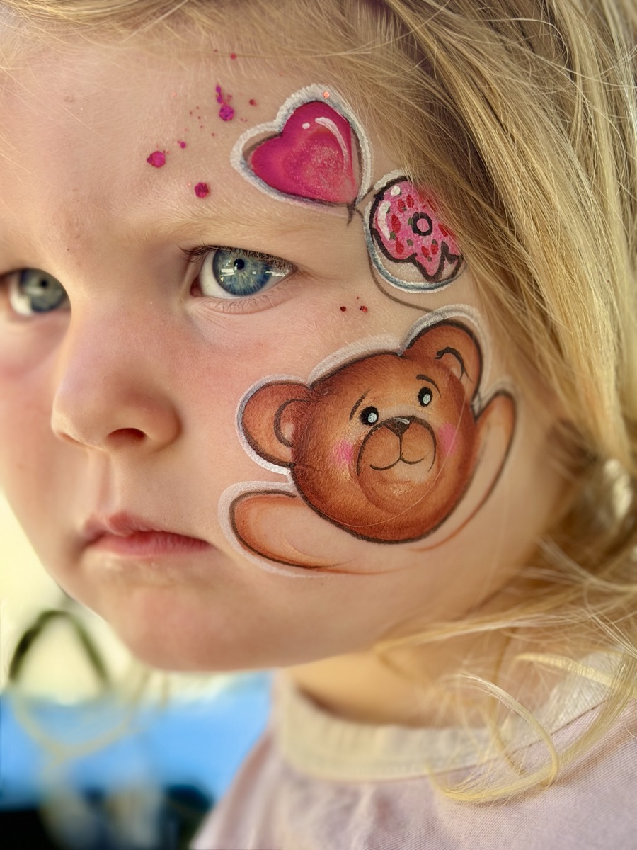 Teddy bear with heart balloon and donut