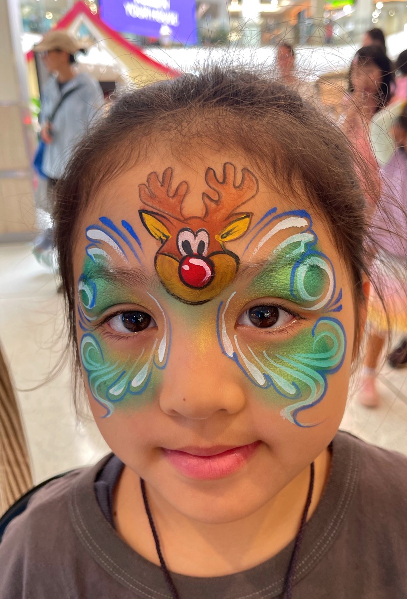 Rudolph with green and blue swirls