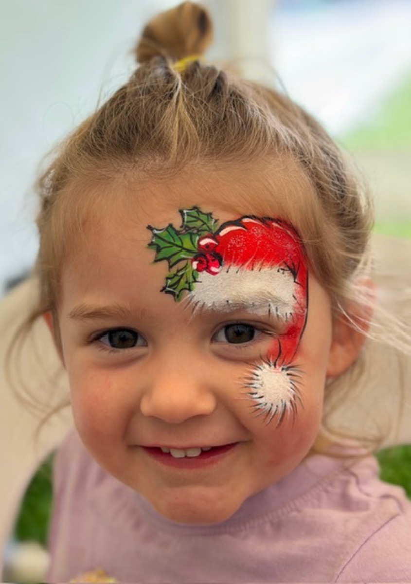 Santa hat with holly and pompom